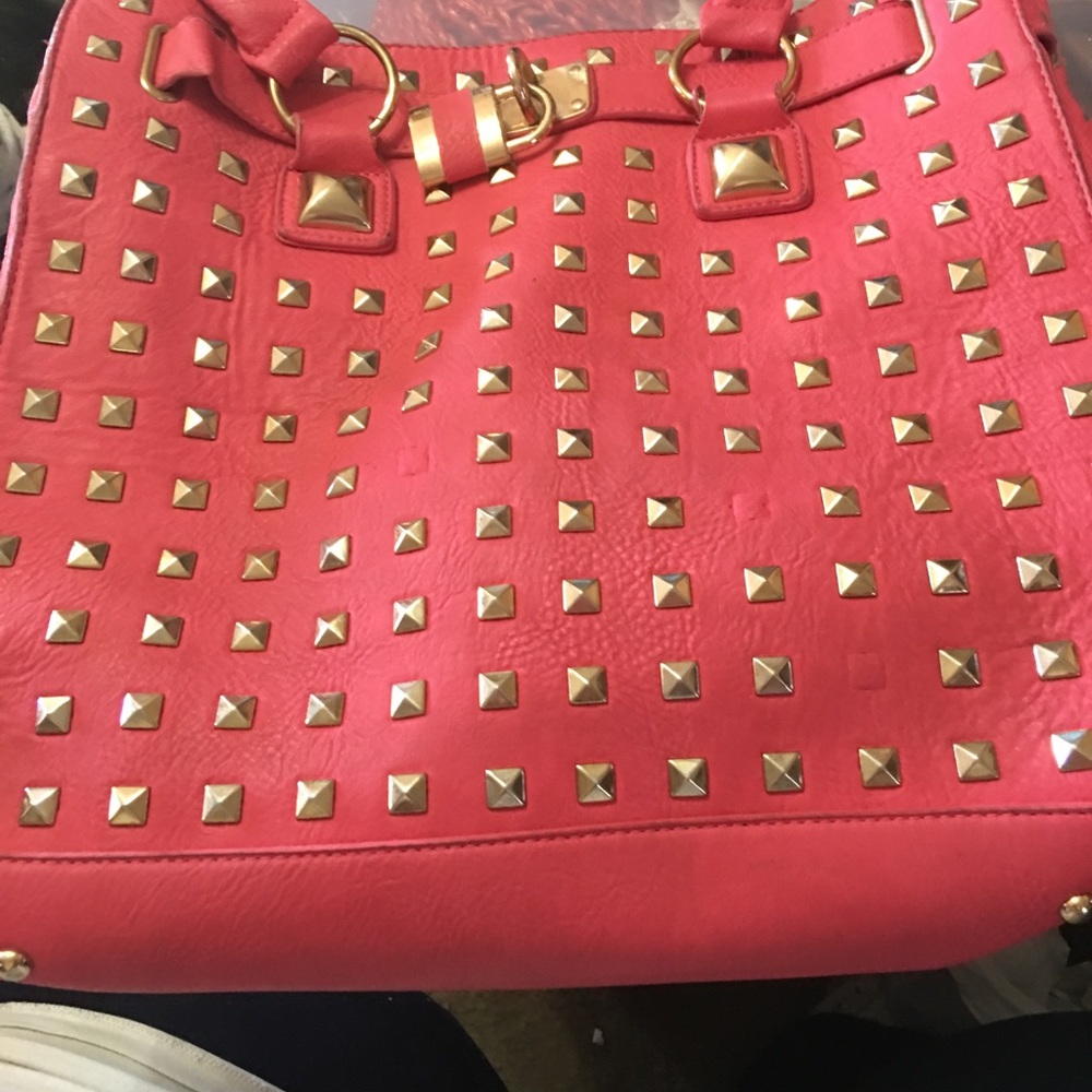 Large studded leather bag